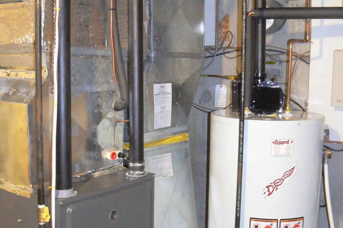 New high-efficiency gas furnace installed in a Orlando basement mechanical room