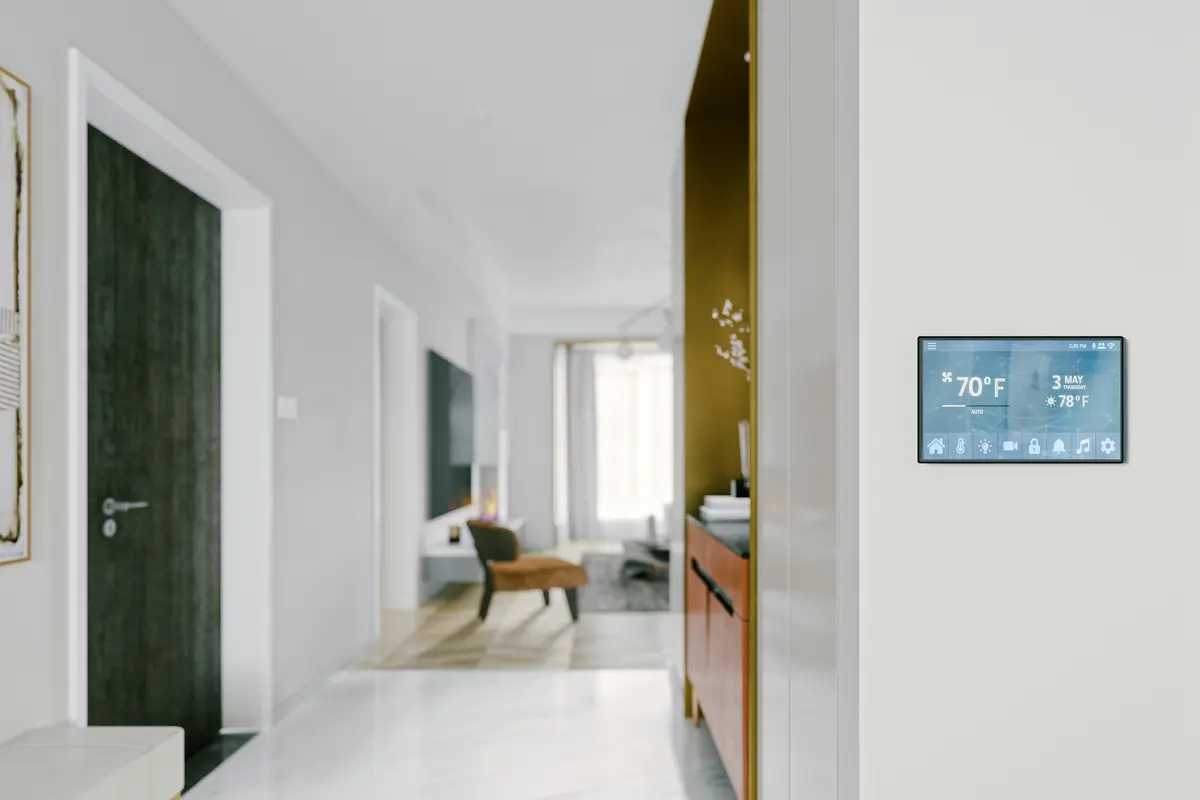 Digital thermostat installation on wall